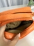 Bolsa lô em couro legítimo - laranja na internet