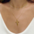 Colar com crucifixo banhado em ouro 18K na internet