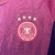 camisa-selecao-alemanha-away-reserva-ii-2-magenta-roxo-branca-24-25-adidas-tocedor-feminina-gola-redonda-4.jpg