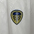 camisa-leeds-home-i-1-branca-azul-royal-23-24-adidas-torcedor-masculino-boxt-gola-redonda-4.jpg