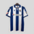 camisa-real-sociedad-home-titular-i-1-azul-royal-branca-24-25-macron-torcedor-masculina-gola-polo-yasuda-group-kutxabank-1.jpg