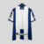 camisa-real-sociedad-home-titular-i-1-azul-royal-branca-24-25-macron-torcedor-masculina-gola-polo-yasuda-group-kutxabank-9.jpg