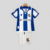 camisa-real-sociedad-home-titular-i-1-azul-royal-branca-24-25-macron-torcedor-unissex-gola-polo-yasuda-group-kutxabank-kit-infantil-short-branco-1.jpg