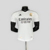 camisa-real-madrid-home-titular-i-1-branca-preta-24-25-adidas-jogador-masculina-gola-v-emirates-fly-better-hp-1.jpg