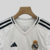 camisa-real-madrid-home-titular-i-1-branca-preta-24-25-adidas-torcedor-masculina-gola-v-emirates-fly-better-hp-kit-infantil-short-branco-2.jpg