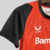 camisa-bayer-leverkusen-home-titular-i-1-vermelho-preto-branco-24-25-castore-torcedor-unissex-gola-redonda-barmenia-kit-infantil-short-preto-4.jpg