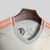 camisa-as-roma-away-reserva-ii-2-off-white-laranja-bordo-24-25-adidas-torcedor-masculina-gola-v-riyadh-season-7.jpg