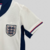 camisa-selecao-inglaterra-home-titular-i-1-branca-azul-escuro-vermelho-24-25-nike-torcedor-unissex-gola-mini-polo-kit-infantil-short-azul-3.jpg