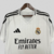 camisa-real-madrid-home-titular-i-1-branca-preta-24-25-adidas-torcedor-masculina-gola-v-emirates-fly-better-hp-3.jpg