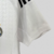 camisa-real-madrid-home-titular-i-1-branca-preta-24-25-adidas-torcedor-feminina-gola-v-emirates-fly-better-hp-7.jpg