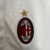 camisa-ac-milan-home-titular-i-1-vermelho-preto-branco-24-25-puma-torcedor-unissex-gola-redonda-emirates-fly-better-msc-kit-infantil-short-branco-7.jpg