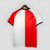 camisa-feyenoord-home-titular-i-1-vermelha-branca-preta-24-25-castore-torcedor-masculina-gola-redonda-media-markt-7.jpg