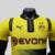 camisa-borussia-dortmund-copas-amarelo-preto-24-25-puma-jogador-masculino-gola-redonda-evonik-3.jpg