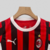 camisa-ac-milan-home-titular-i-1-vermelho-preto-branco-24-25-puma-torcedor-unissex-gola-redonda-emirates-fly-better-msc-kit-infantil-short-branco-2.jpg