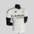 camisa-real-madrid-home-titular-i-1-branca-preta-24-25-adidas-jogador-masculina-gola-v-emirates-fly-better-hp-2.jpg