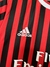 Camisa Milan Home Retro 11/12 Torcedor Masculina - Vermelho e Preto, produto oficial do Milan, camisa de futebol masculina, camisa retrô do Milan, camisa do Milan vermelha e preta, camisa de torcedor do Milan, camisa de futebol do Milan, camiseta do Milan