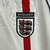 Camisa Inglaterra Home Retro 2002 Torcedor Masculina - Branco, camisa retrô da seleção inglesa, torça pela Inglaterra com estilo, camisa oficial da Inglaterra, camisa masculina para torcedores da Inglaterra, camisa branca com detalhes em vermelho e azul, 