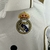 Kit infantil Real Madrid, camisa retrô Real Madrid, uniforme infantil Real Madrid, branco e azul, kit completo infantil Real Madrid, presente para crianças, torcedor mirim do Real Madrid, qualidade e tradição do Real Madrid, camiseta infantil do Real Madr