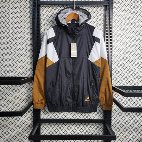 Jaqueta adidas hot sale preta e dourada