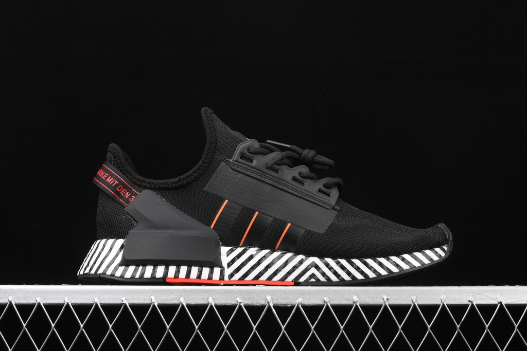 Nmd on sale black orange