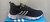 Tenis Adidas Fast Pro 33Y Preto Branco na internet