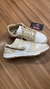 Nike Dunk Low Dourado na internet