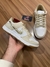 Nike Dunk Low Dourado