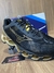 Mizuno Pro X Preto/Dourado na internet