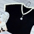 Blusa bicolor preto/off Audrey na internet