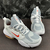 Nike Air Max Alpha Savage Wolf Grey Habanero na internet