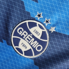 Uniforme Grêmio Polo Conference 2022-2023 na internet