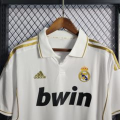 Uniforme Real Madrid Retro Gold 2011 na internet