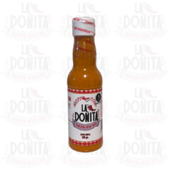 Salsa La Doñita 4.40 oz red label spicy.