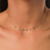 Choker dourada com Zircônias Turmalina