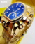 Relógio Masculino Invicta Zeus Magnum Dourado Fundo Azul na internet