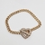 PULSEIRA CORACAO BANHO EM RODIO OURO 18K - comprar online