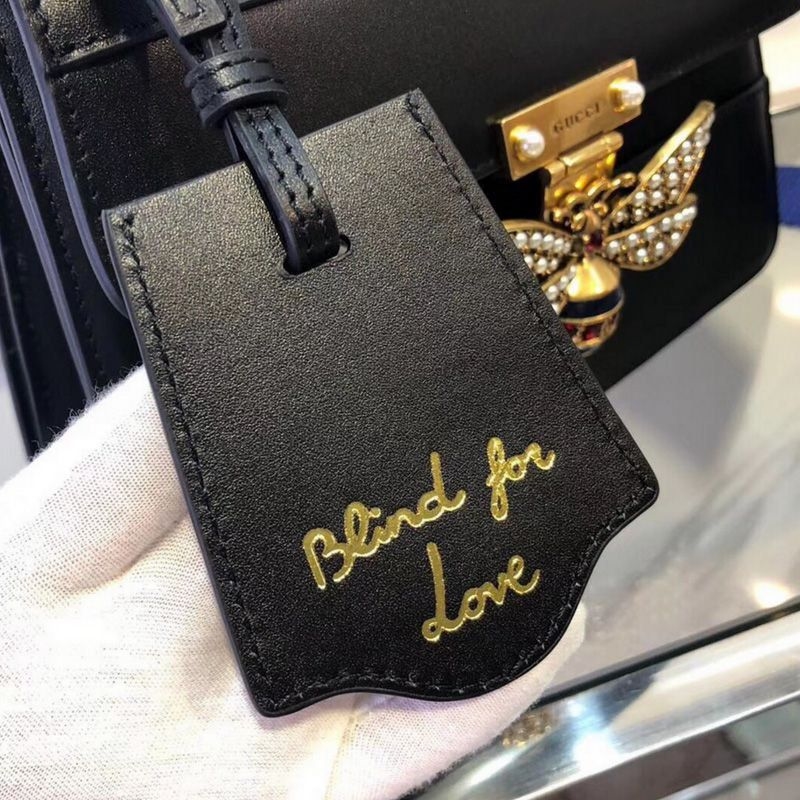 Bolsa GG Queen Margaret Top Handle 476541 tem a abelha que e simbolo