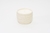 Vela blanca en recipiente de cerámica con textura-chico