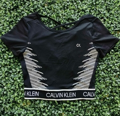 Blusa negra con lineas blancas a los laterales Calvin Klein