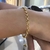 Pulseira Elo Portugues 4mm Boia Banhada a Ouro 18k