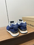 New Balance 574 x Miu Miu denim sneakers na internet