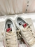 Imagem do Golden Goose Super-Star Feminino LTD CNY com estrela cor de marfim