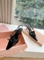 Imagem do Miu Miu slingback em couro envernizado com fivelas - "preto"