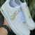 Tênis Nike Branco /Dourado