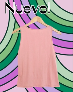 Blusa rosa con abertura