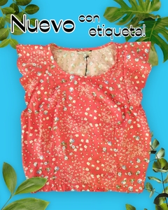 Blusa floreada con resorte en cintura