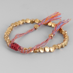 Pulsera de cuerda de la suerte con cuentas de cobre y algodón trenzado budista en internet