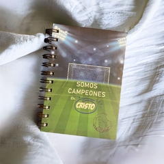 Libreta anillada "Solos campeones en Cristo”