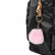 Mochila preta com rosae e rosé gold BRW - Com bolsos e chaveiro pompom - comprar online