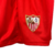 Kit Infantil Sevilla II Castore 23/24 - Vermelho com ondulações cinza e dourado - CRAQUE NA MODA- CAMISAS DE TIME